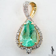 7.65 CT. Diamond and Emerald Ladies Pendant in 14K Yellow Gold