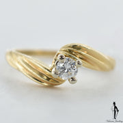 14K Yellow Gold SI1 Diamond (0.25 CT.) Swirl Style Engagement Ring