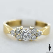 18K Yellow Gold SI1-VS Diamond (0.43 CT.) Solitaire Engagement Ring With Shoulder Settings